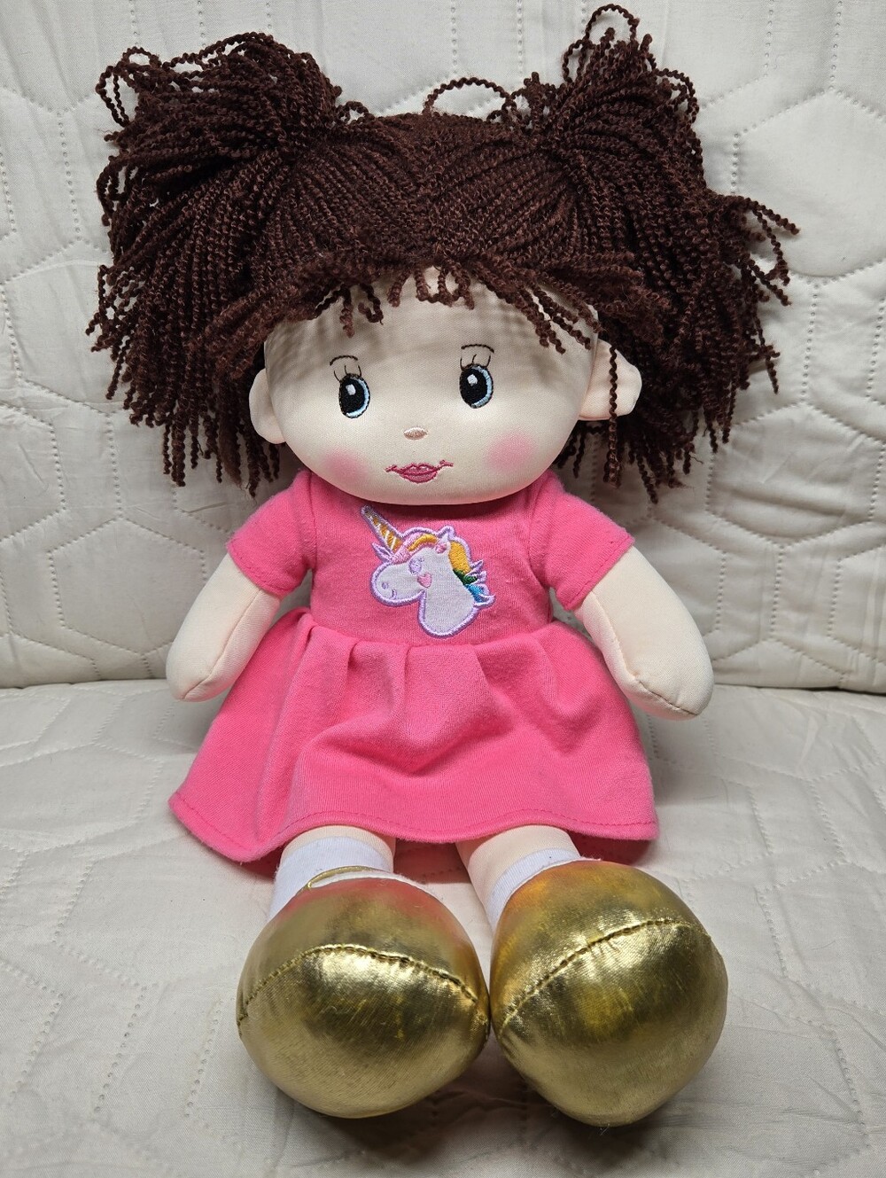 16" Laura Plush Rag Doll featuring a pink unicorn dress and gold shoes